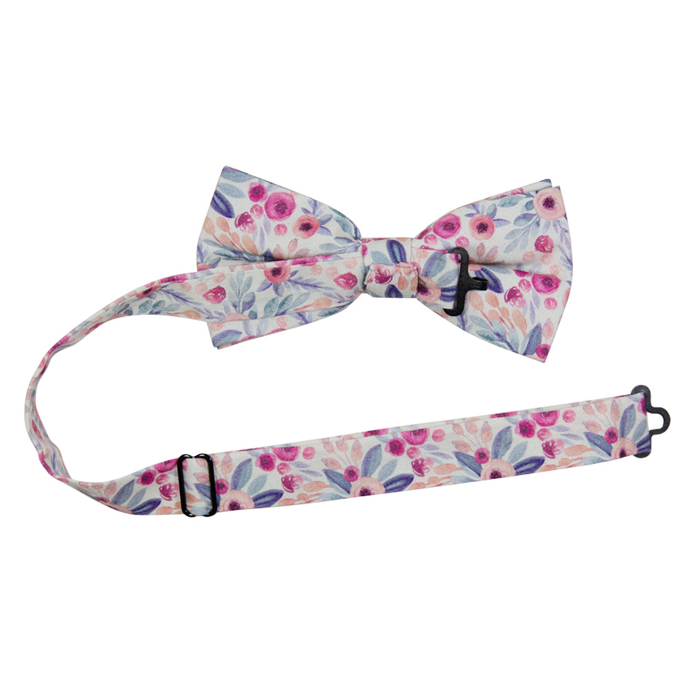 Hermosa Pre-Tied Bow Tie with adjustable neck strap. Cream/off white background with pink and peach circular flowers and blue and green leaves throughout.