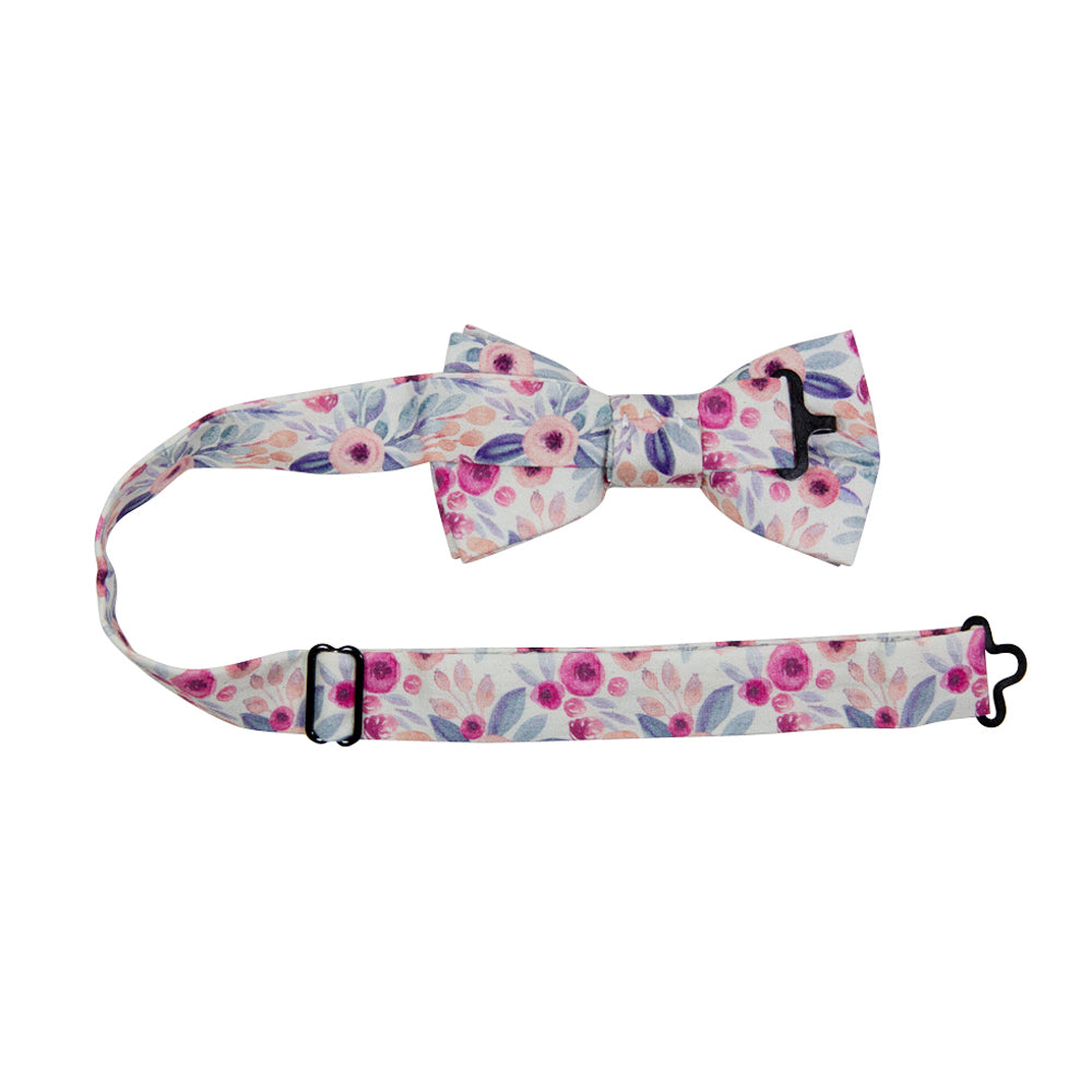 Hermosa Pre-Tied Bow Tie with adjustable neck strap. Cream/off white background with pink and peach circular flowers and blue and green leaves throughout.