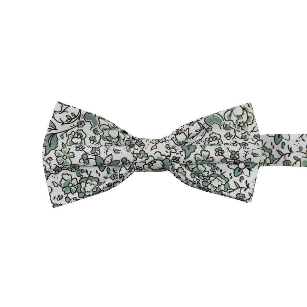 Hidden Garden Pre-Tied Bow Tie. White background with sage green flowers and leaves with black vines.