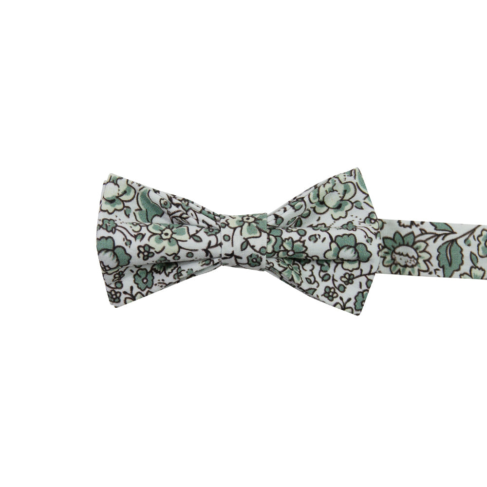 Hidden Garden Pre-Tied Bow Tie. White background with sage green flowers and leaves with black vines.