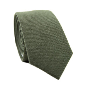 Jungle Skinny Tie. Solid green textured fabric.