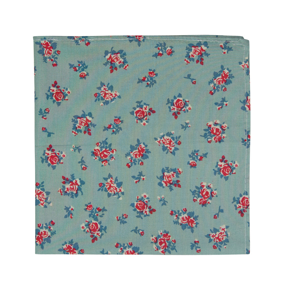Leid Back Pocket Square. Mint green background with small red flowers and dusty blue flowers throughout. 
