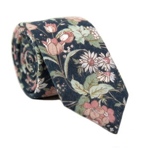 Lotus Skinny Tie. Navy background with white and blush pink flowers and sage green stems and leaves.