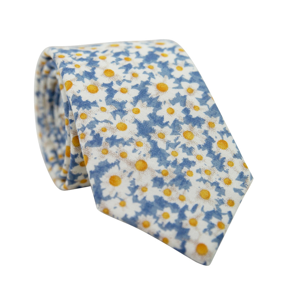 Mahalo Floral Skinny Tie. Dusty blue background with medium sized white and yellow daisy flowers throughout.