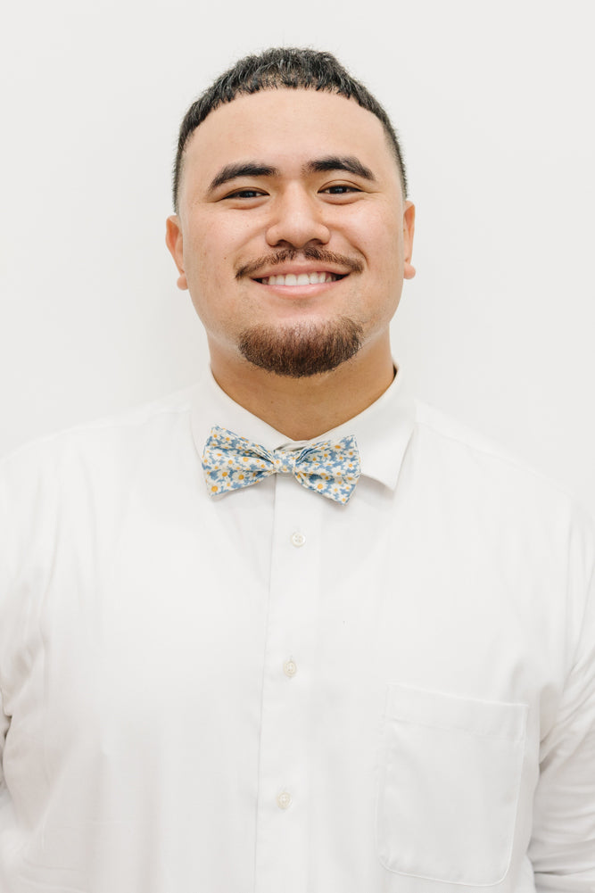 Mahalo pre-tied bow tie worn with a white shirt.