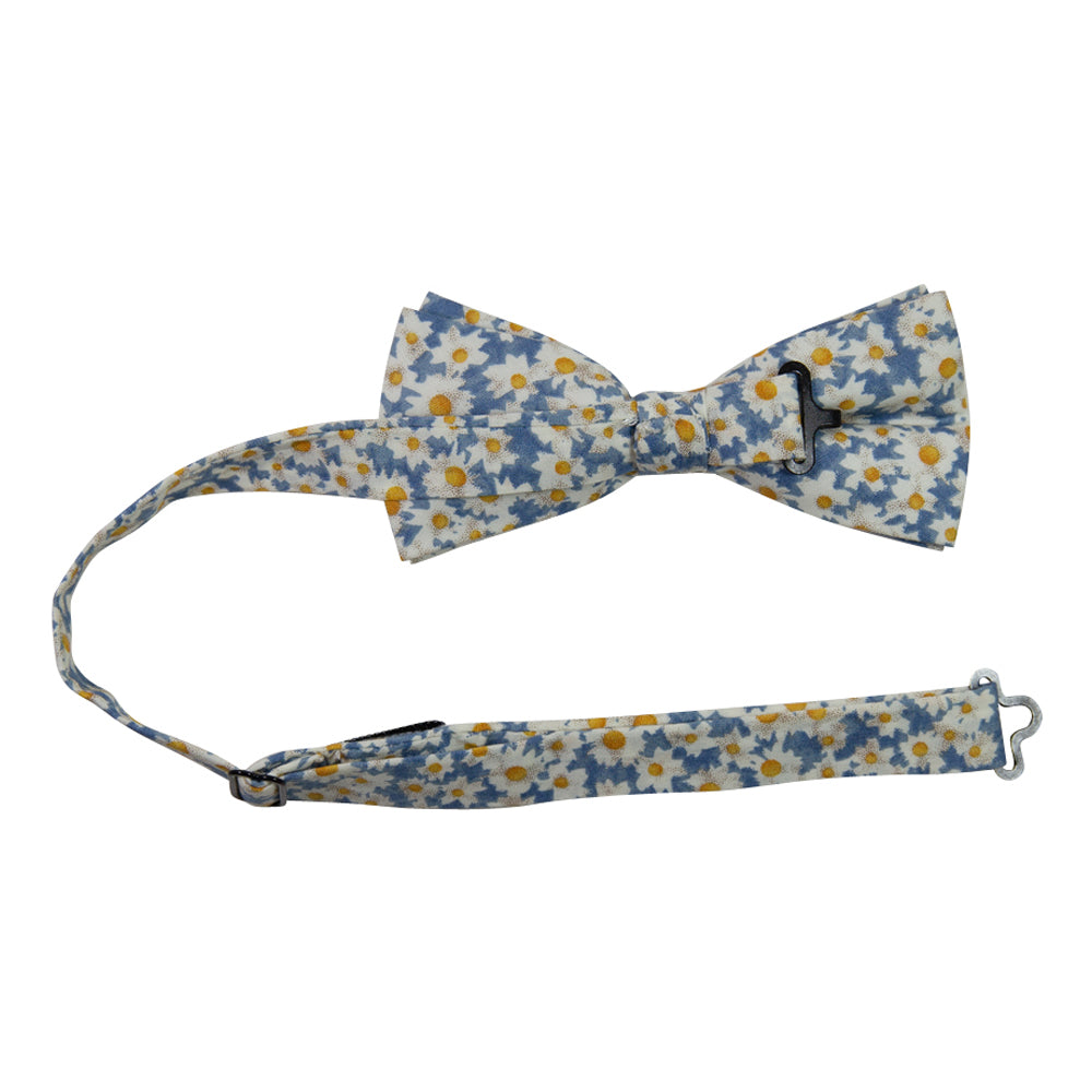 Mahalo Floral Pre-Tied Bow Tie with adjustable neck strap. Dusty blue background with medium sized white and yellow daisy flowers throughout.