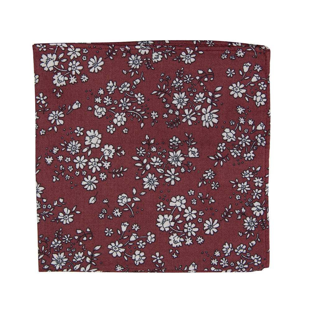 Mahogany Floral Pocket Square. Burgundy background with small white flowers and black stems throughout.