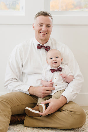 Mahogany pre-tied bow tie worn by a father and son with a white shirt and tan pants.