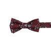 Mahogany Floral Pre-Tied Bow Tie. Burgundy background with small white flowers and black stems throughout.