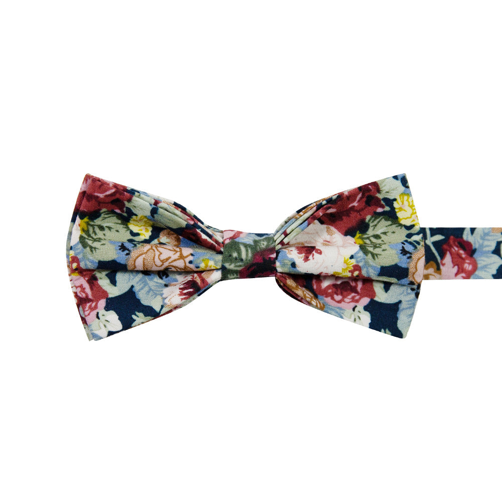 Mardi Pre-Tied Bow Tie. Navy background with yellow, red, and cream flowers and blue leaves.