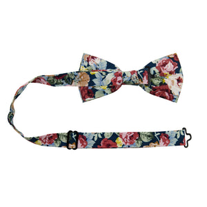 Mardi Pre-Tied Bow Tie with adjustable neck strap. Navy background with yellow, red, and cream flowers and blue leaves.