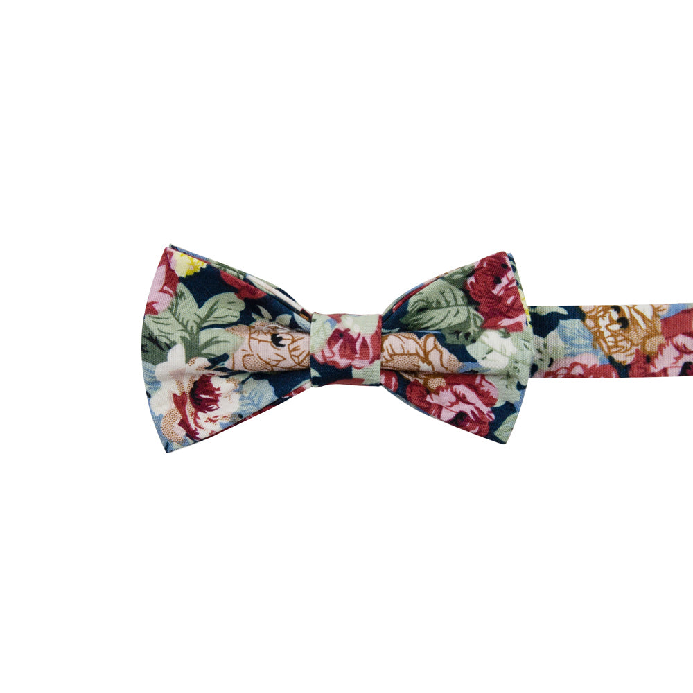 Mardi Pre-Tied Bow Tie. Navy background with yellow, red, and cream flowers and blue leaves.