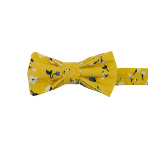 Marigold Pre-Tied Bow Tie. Yellow background with small white, black and blue flowers.