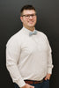 Misty Love pre-tied bow tie worn with a white shirt and blue pants.