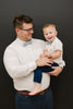 Misty Love pre-tied bow tie worn by a father and son with a white shirt and blue pants.