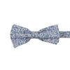 Misty Love Floral Pre-Tied Bow Tie. White background with small blue, green, and pink flowers and mint green and blue leaves throughout.