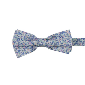 Misty Love Floral Pre-Tied Bow Tie. White background with small blue, green, and pink flowers and mint green and blue leaves throughout.