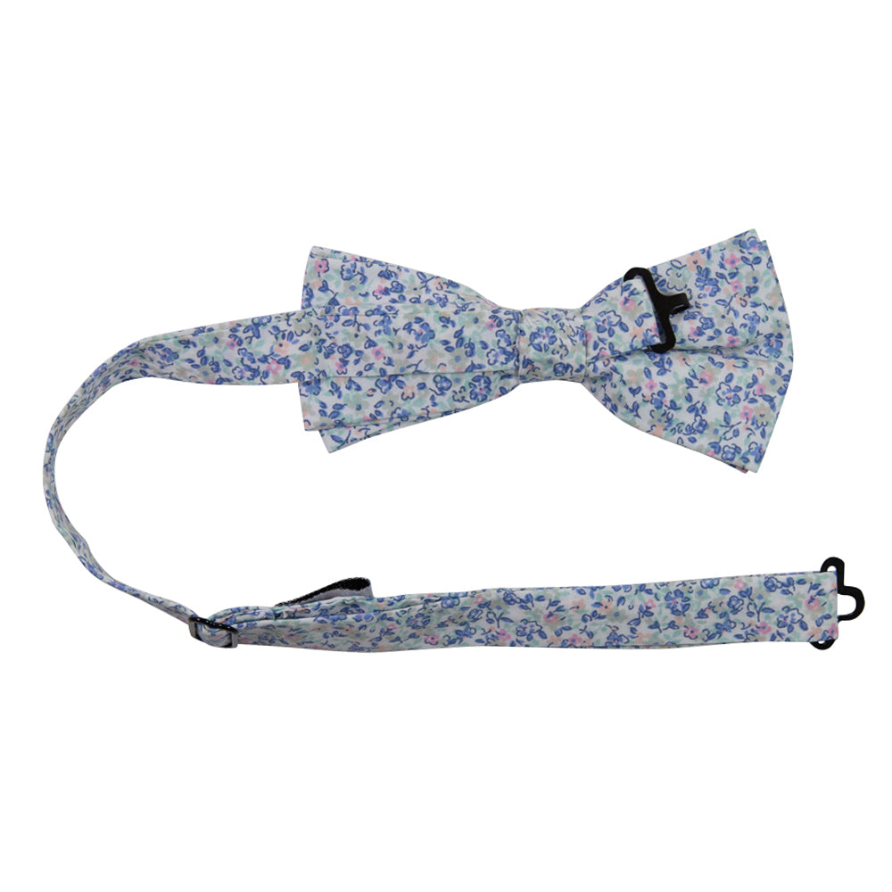 Misty Love Floral Pre-Tied Bow Tie with adjustable neck strap. White background with small blue, green, and pink flowers and mint green and blue leaves throughout.
