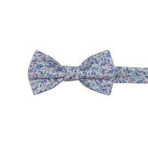 Misty Love Floral Pre-Tied Bow Tie. White background with small blue, green, and pink flowers and mint green and blue leaves throughout.
