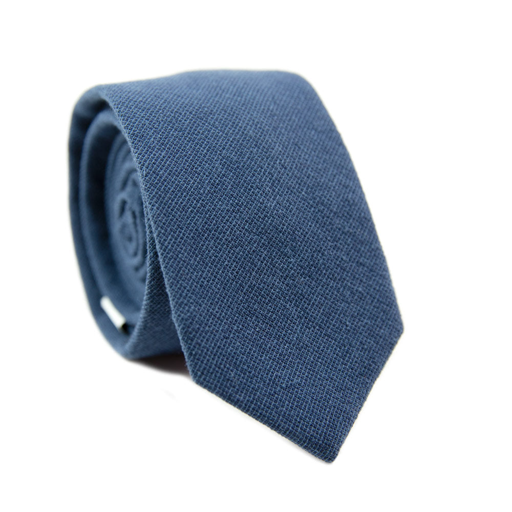 Navy Skinny Tie. Textured solid navy blue fabric.