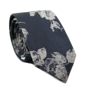 Nightfall Skinny Tie. Black background with big cream flowers.