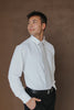 Onyx Tie worn with a white shirt and black pants.