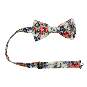 Orange Pansy Pre-Tied Bow Tie with adjustable neck strap. Cream background with orange, blue, sage green, white and lavender flowers.