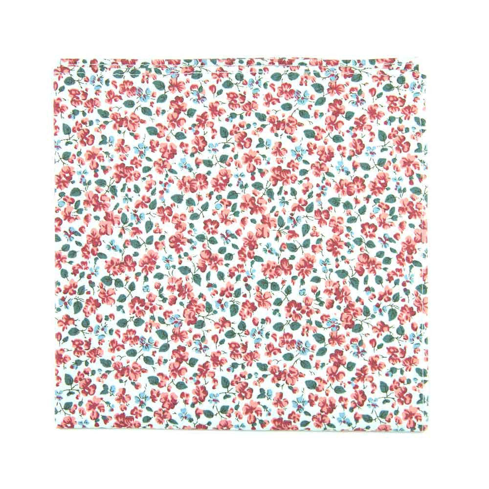 Peach Blossom Pocket Square. White background with small red and dusty blue flowers and small green leaves.