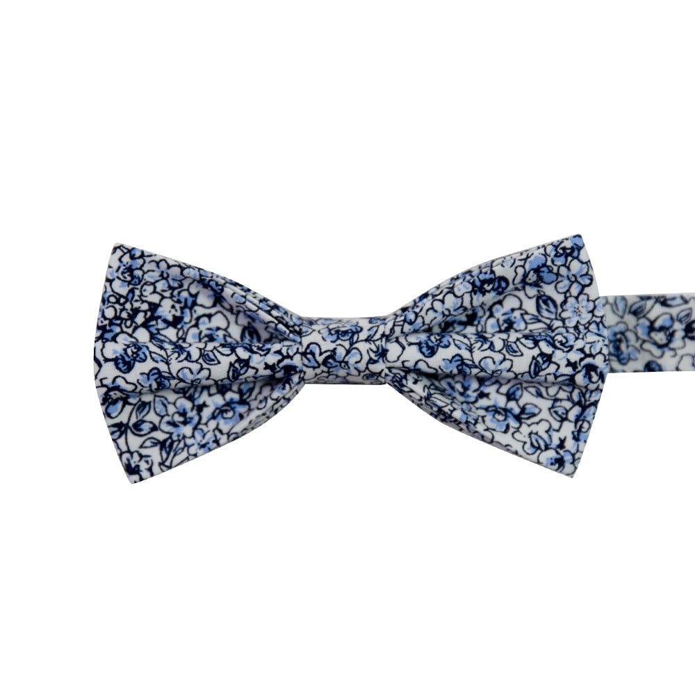 Powder Pre-Tied Bow Tie. White background with small navy and dusty blue flowers and black stems.