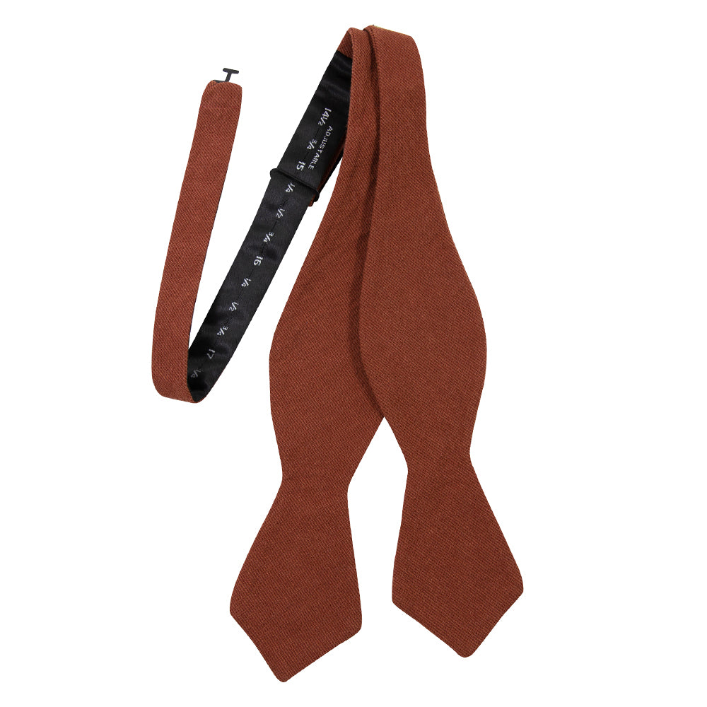Rust Self Tie Bow Tie. Solid burnt red/orange textured fabric.