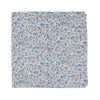 Scorpion Grass Floral Pocket Square. White background with small dusty blue and tan flowers throughout.