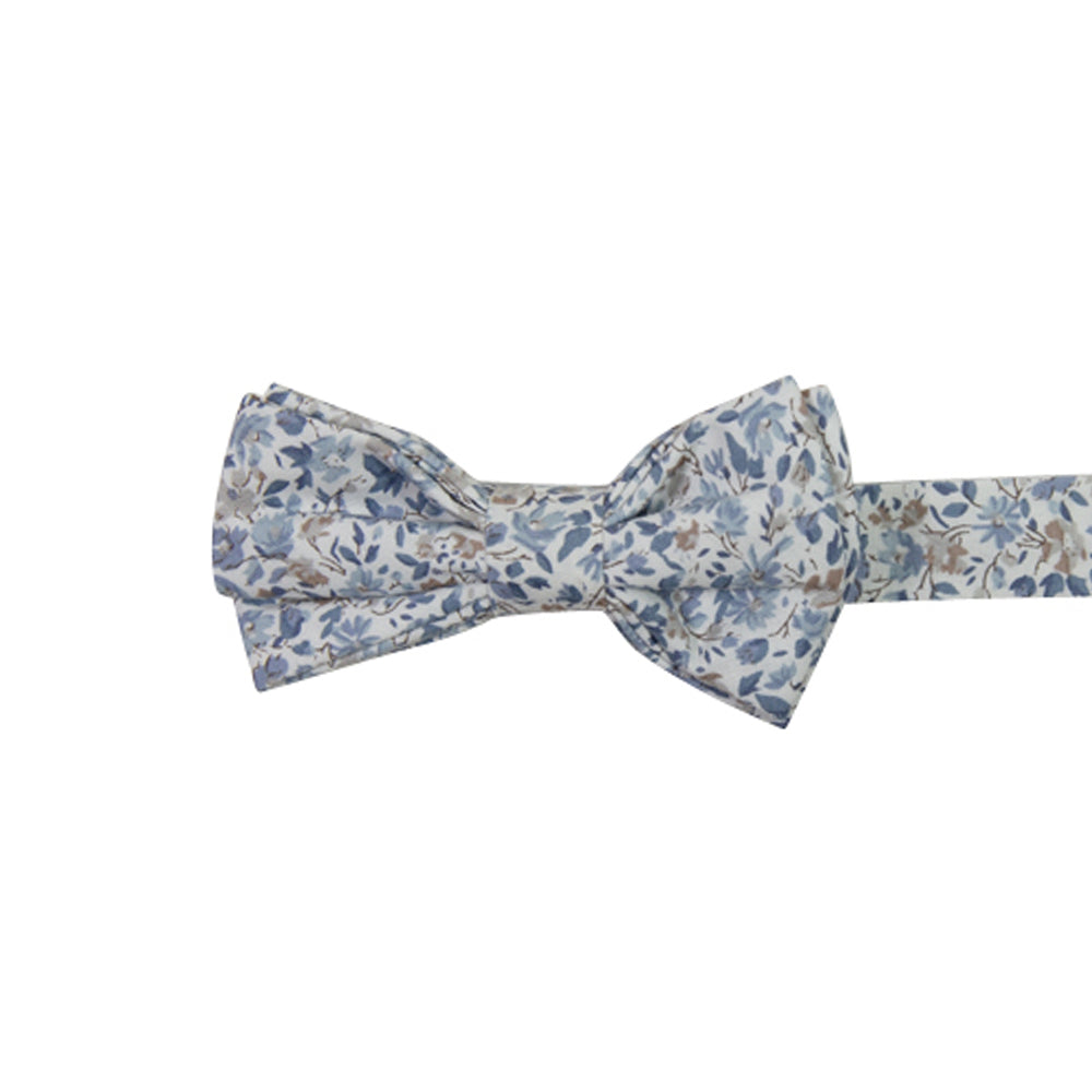 Scorpion Grass Floral Pre-Tied Bow Tie. White background with small dusty blue and tan flowers throughout.