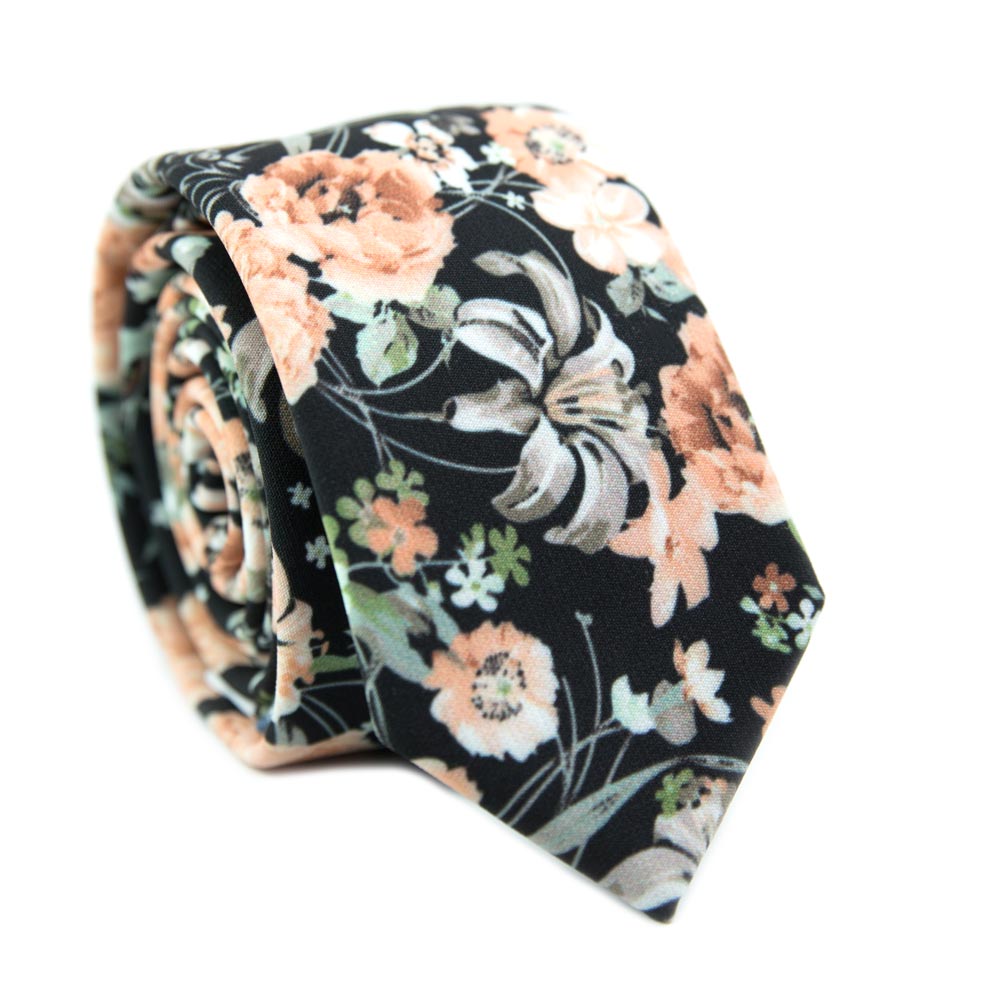 Secret Garden Skinny Tie. Black background with light orange flowers, white and gray flowers, and green leaves.