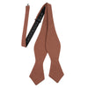 Sedona Self Tie Bow Tie. Solid light faded red textured fabric.