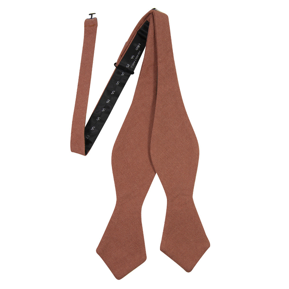 Sedona Self Tie Bow Tie. Solid light faded red textured fabric.