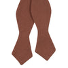 Sedona Self Tie Bow Tie. Solid light faded red textured fabric.