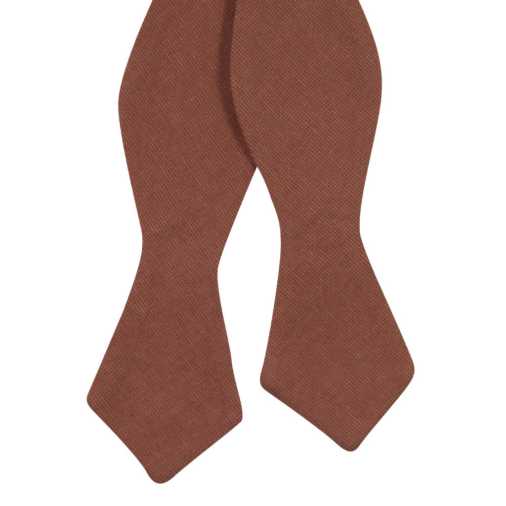 Sedona Self Tie Bow Tie. Solid light faded red textured fabric.