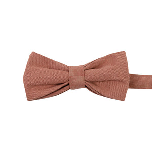Sedona Pre-Tied Bow Tie. Solid light faded red textured fabric.