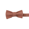Sedona Pre-Tied Bow Tie. Solid light faded red textured fabric.