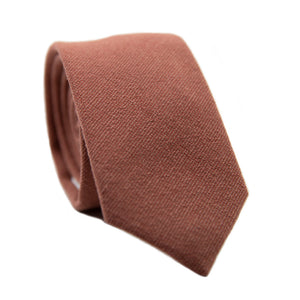 Sedona Skinny Tie. Solid light faded red textured fabric.