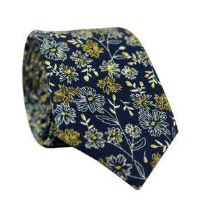 Senna Skinny Tie. Navy blue background with small white and gold flowers throughout.