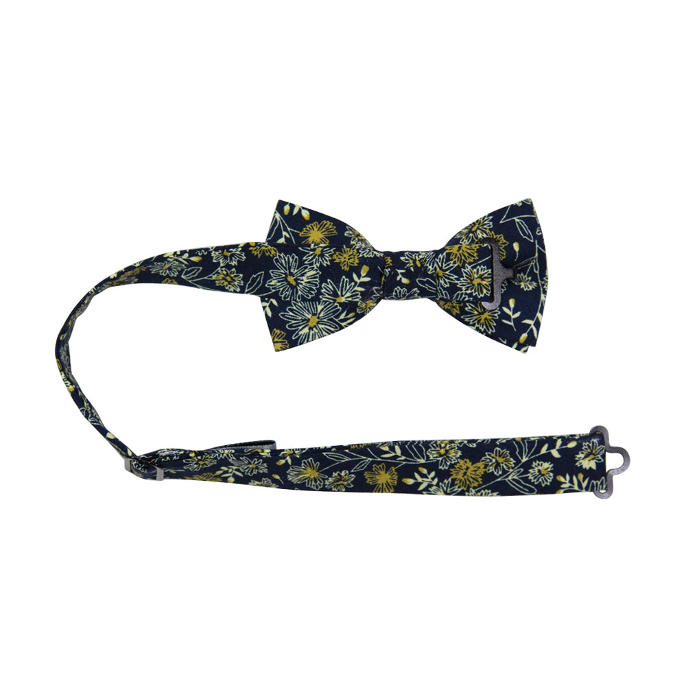 Senna Pre-Tied Bow Tie with adjustable neck strap. Navy blue background with small white and gold flowers throughout.