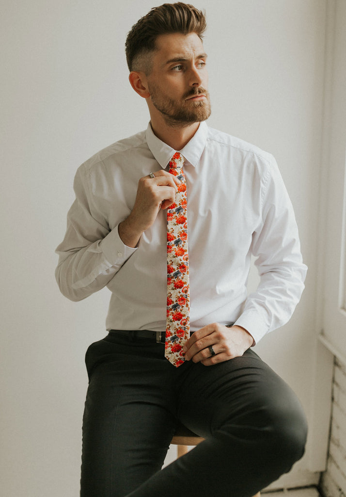 Silent Love tie worn with a white shirt, black belt and black pants.