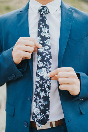 Star Gaze tie worn with a white shirt, brown belt and royal blue suit.