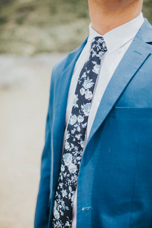 Star Gaze tie worn with a white shirt and royal blue suit jacket.