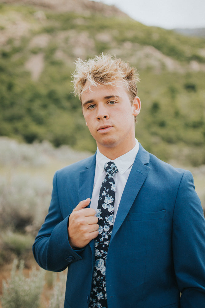 Star Gaze tie worn with a white shirt and royal blue suit jacket.