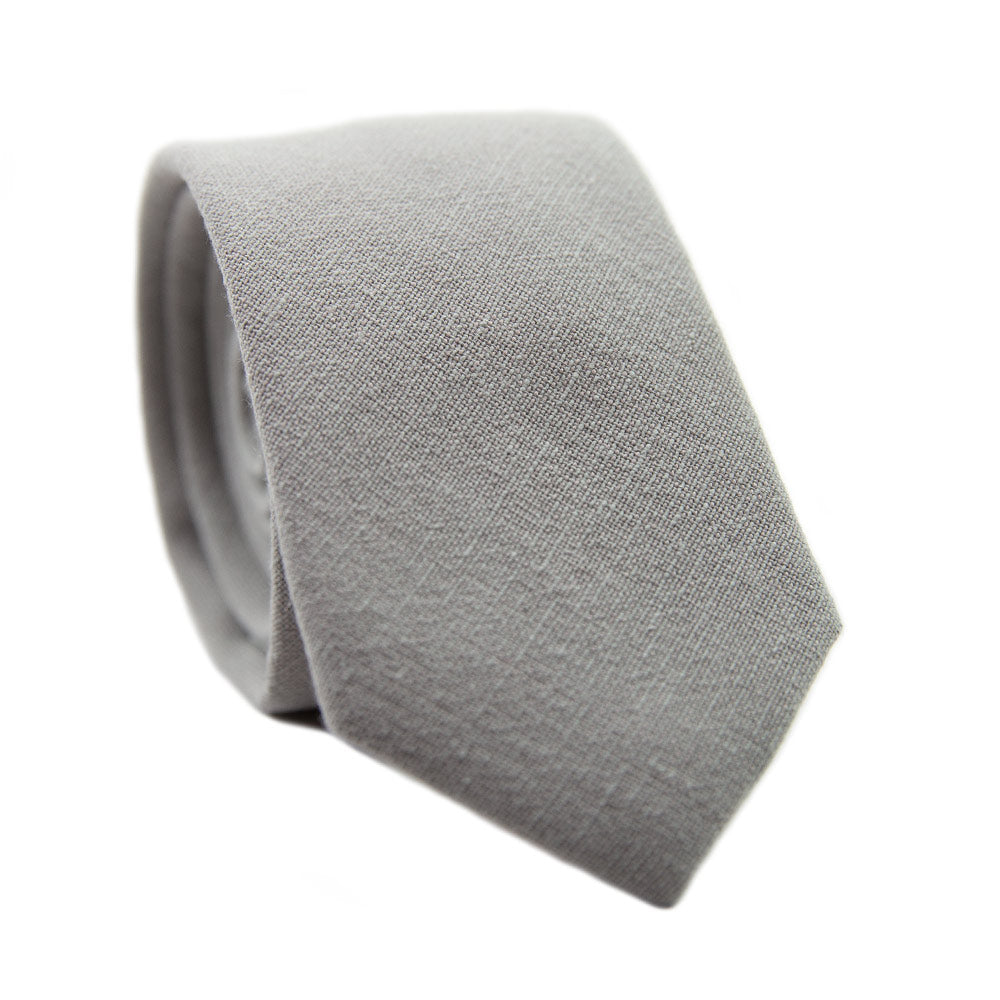 Stone Skinny Tie. Solid light gray textured fabric.