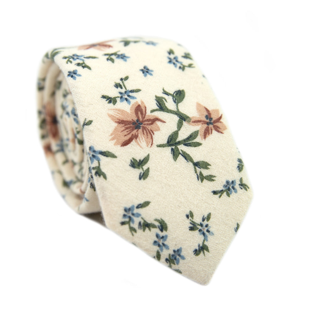 Sugar Blossom Skinny Tie. Cream background with medium size mauve flowers, small dusty blue flowers, and sage green leaves.