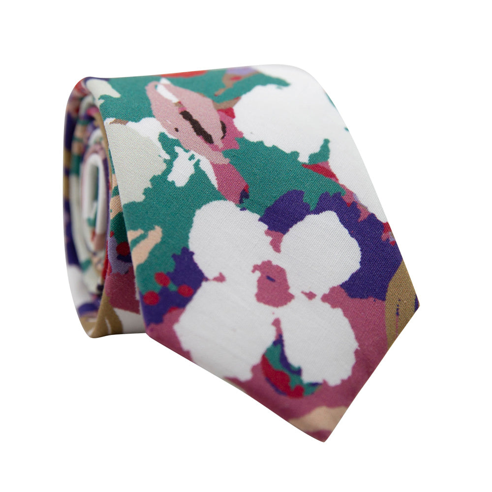 Surfs Up Skinny Tie. Big white and red flowers with gold and pink leaves on top of a teal, pink, purple and blue background.