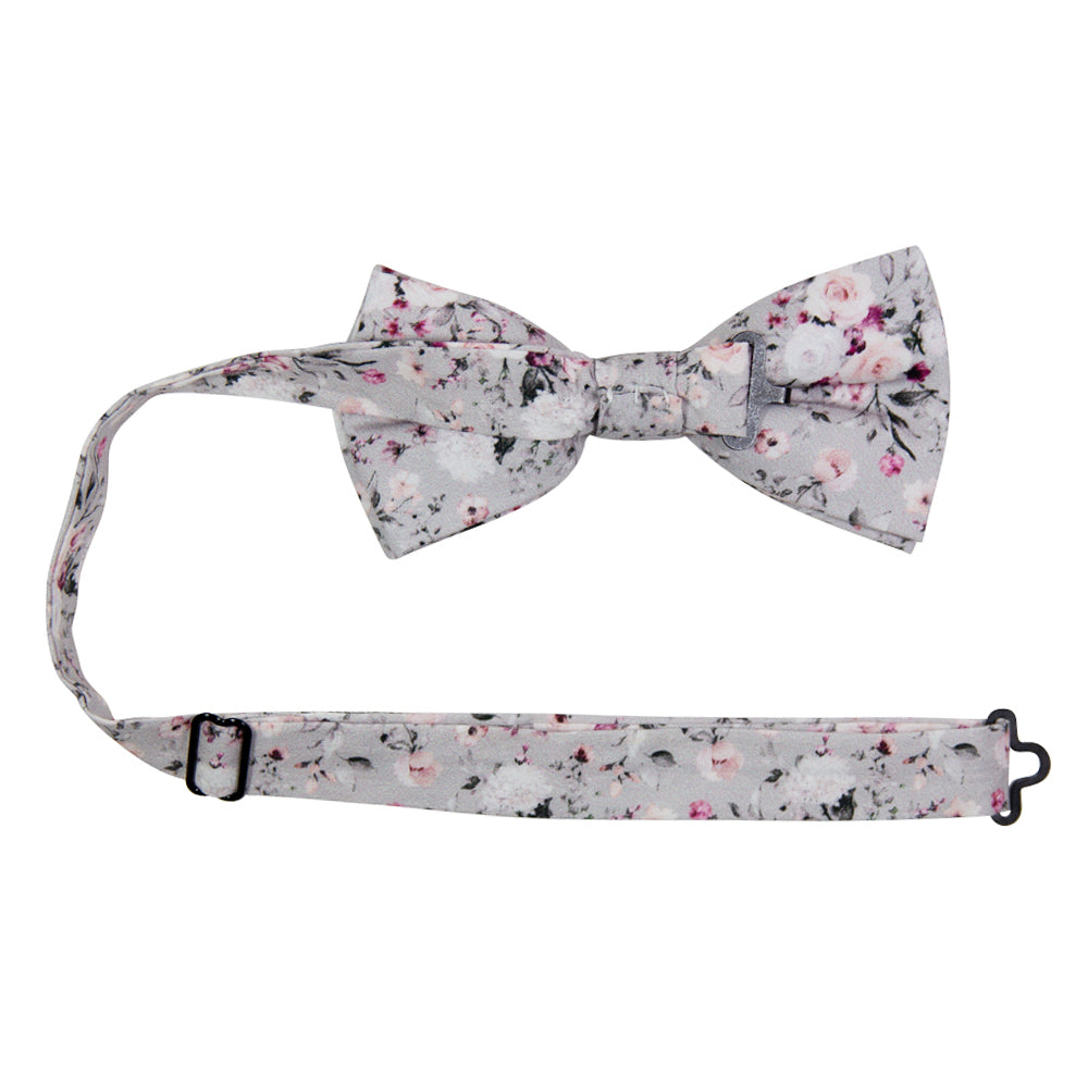 Sweet Pea Pre-Tied Bow Tie with adjustable neck strap. Light gray background with groups of white, blush and burgundy flowers and black and gray stems and leaves.